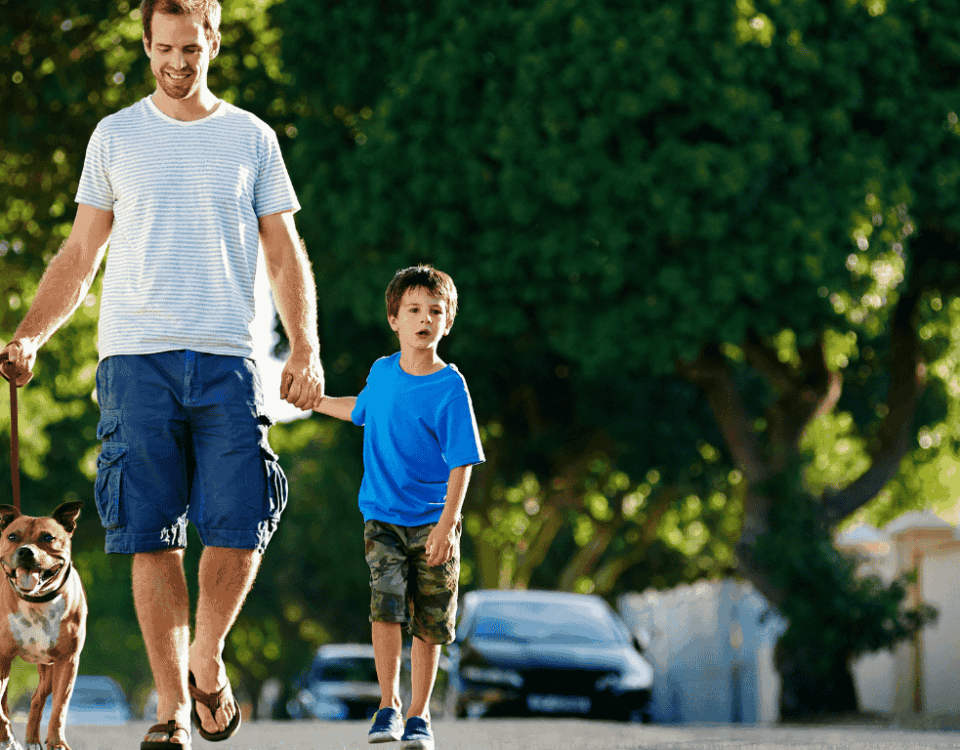 child with dad during the summer